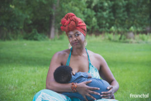 outdoor breastfeeding session portrait